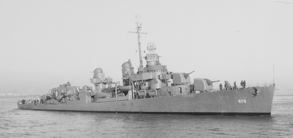 Destroyer Charles Ausburne, DD 570, has multiple radar sets visible, one for fire control atop the director and two search radars on the mast.